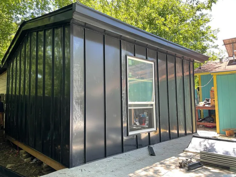 Black standing seam metal wall panels for Roof Inspection in Rockville Centre