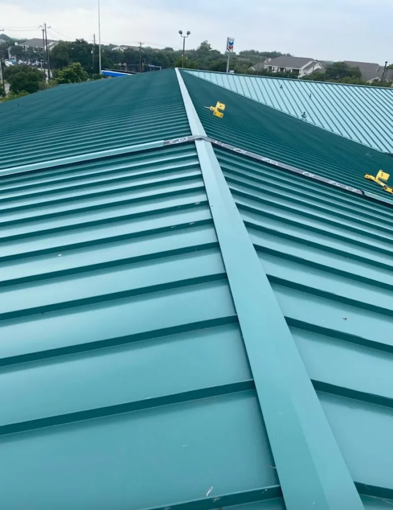 Green commercial metal roof ridge and valley for Metal Roof Repair in Rockville Centre